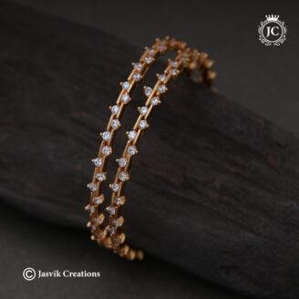 Chic Sleek Zig-Zag Pattern Diamond-Look AD Stone Gold Finish Bangles - JCBN360